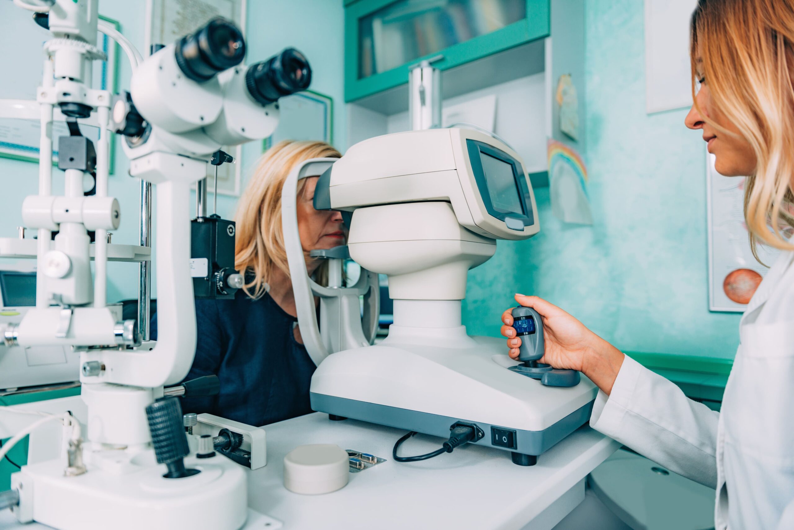 optometrist examining patient clinic scaled